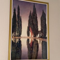 A large glass panel with gold edges.