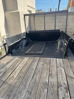 Ford Drop in plastic bed liner 5.5 ft bed! Used slight but in great condition! Easy to install!