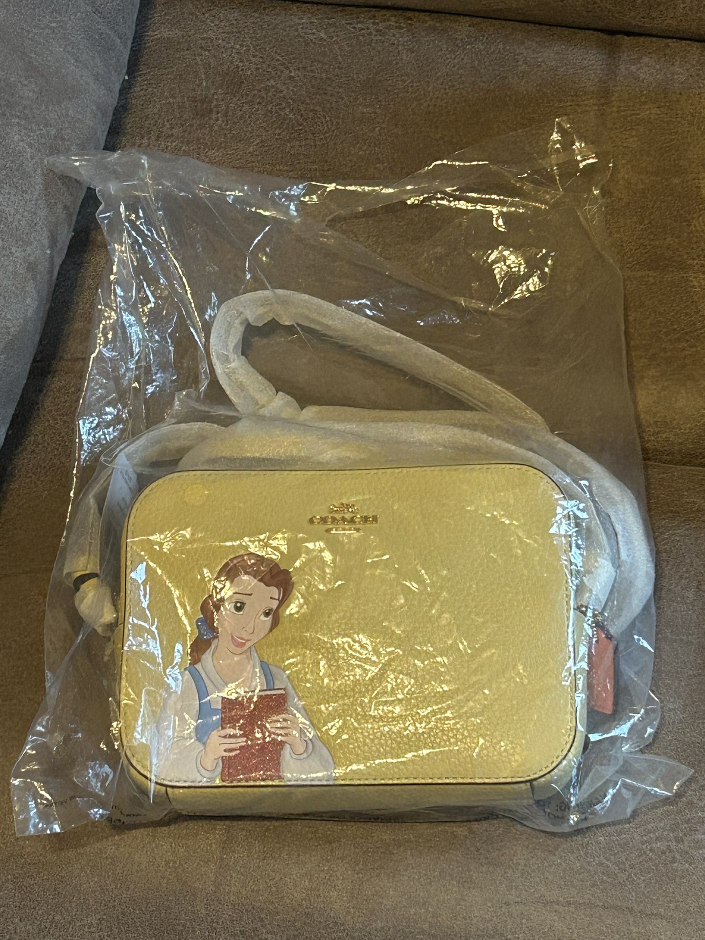 Coach Belle Crossbody/Yellow Beauty and the Beast bag.   Also selling other coach items  