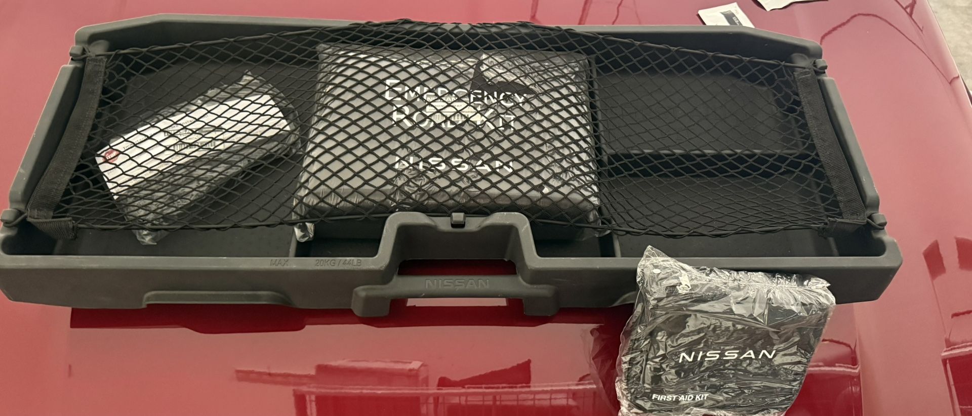 Nissan Carpet Floor Mat And Trunk Organizer With A Emergency Road Side And First Aid Kit
