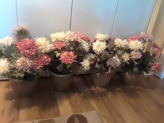 Potted artificial flowers