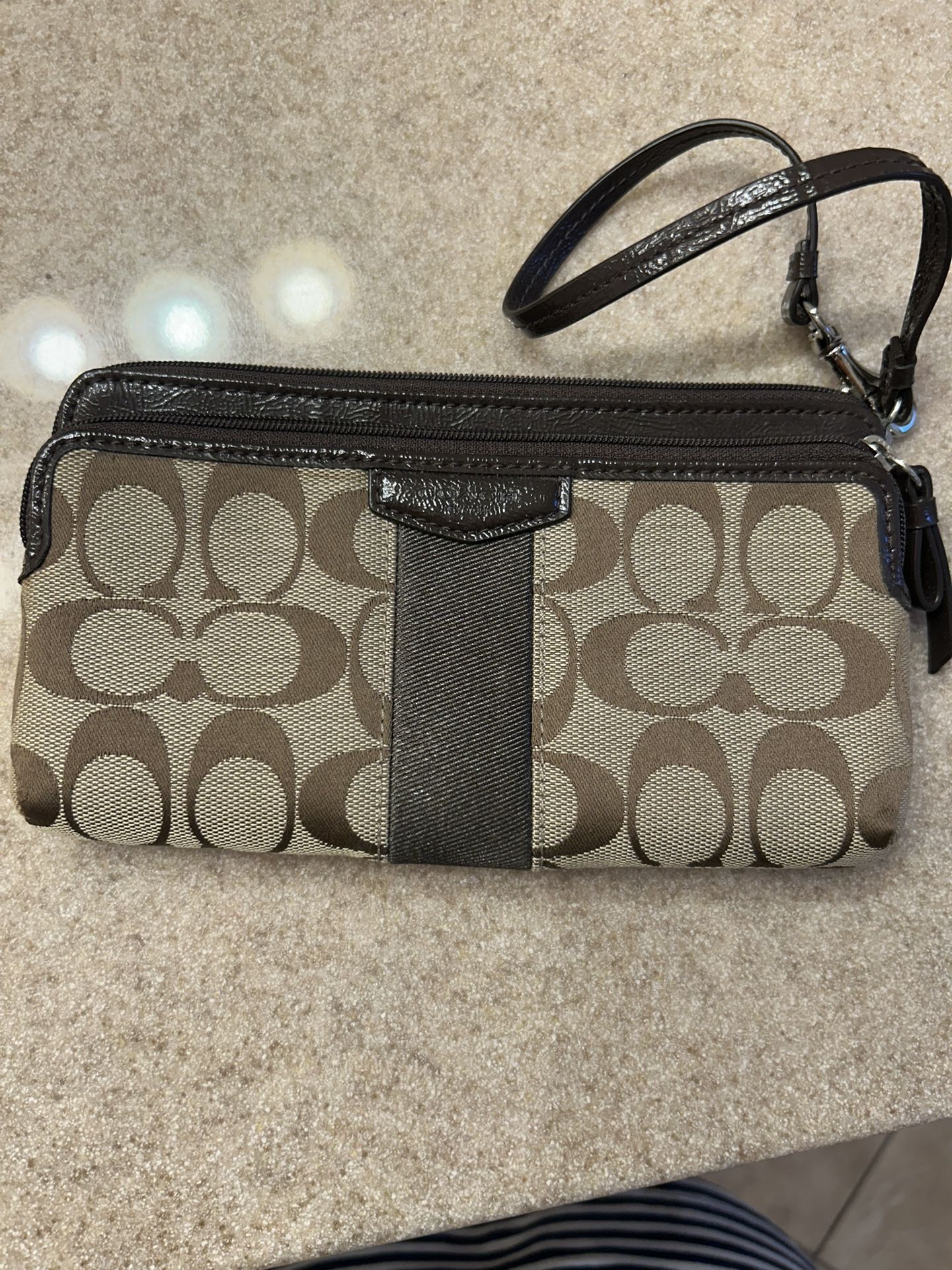 Coach Designer Wristlet NEW. $30