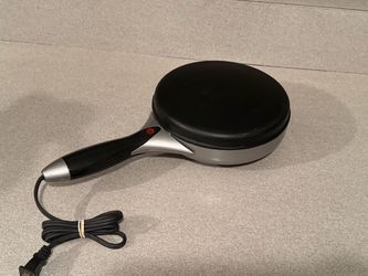 VillaWare NonStick Electric Crepe Maker (Model 5225), featuring a round silver and black design with an ergonomic handle.