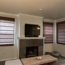 Four Brown Window Shades