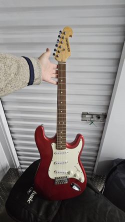 Electronic Guitar And An Amp
