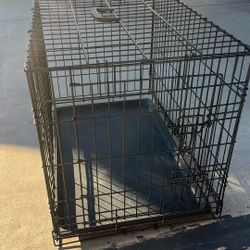 almost new dog cage medium size