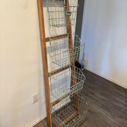 Ladder with baskets