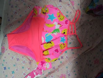 Brand new bathing suit and shirts for girls