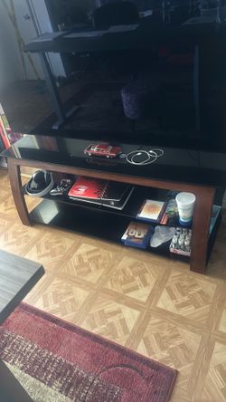 Glass+wood entertainment center.