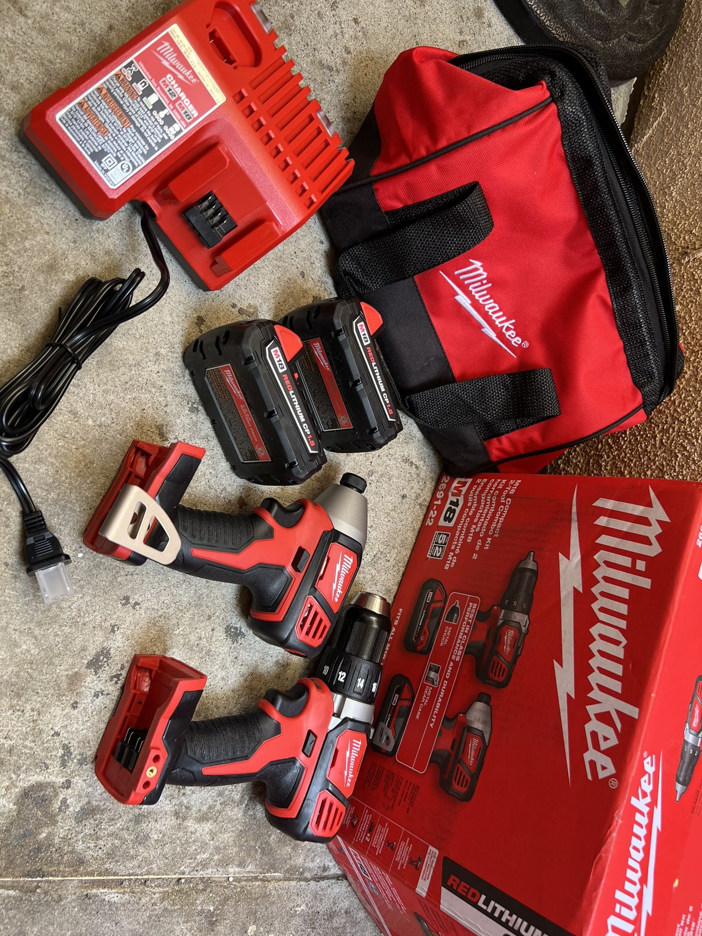 Milwaukee M18 18V Lithium-lon Cordless Drill Driver/Impact Driver Combo Kit (2-Tool) W/ Two 1.5Ah Batteries, Charger Tool Bag