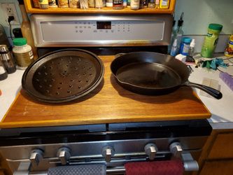 Cabelas 14 Inch Cast Iron Skillet And Lid for Sale in Chehalis, WA