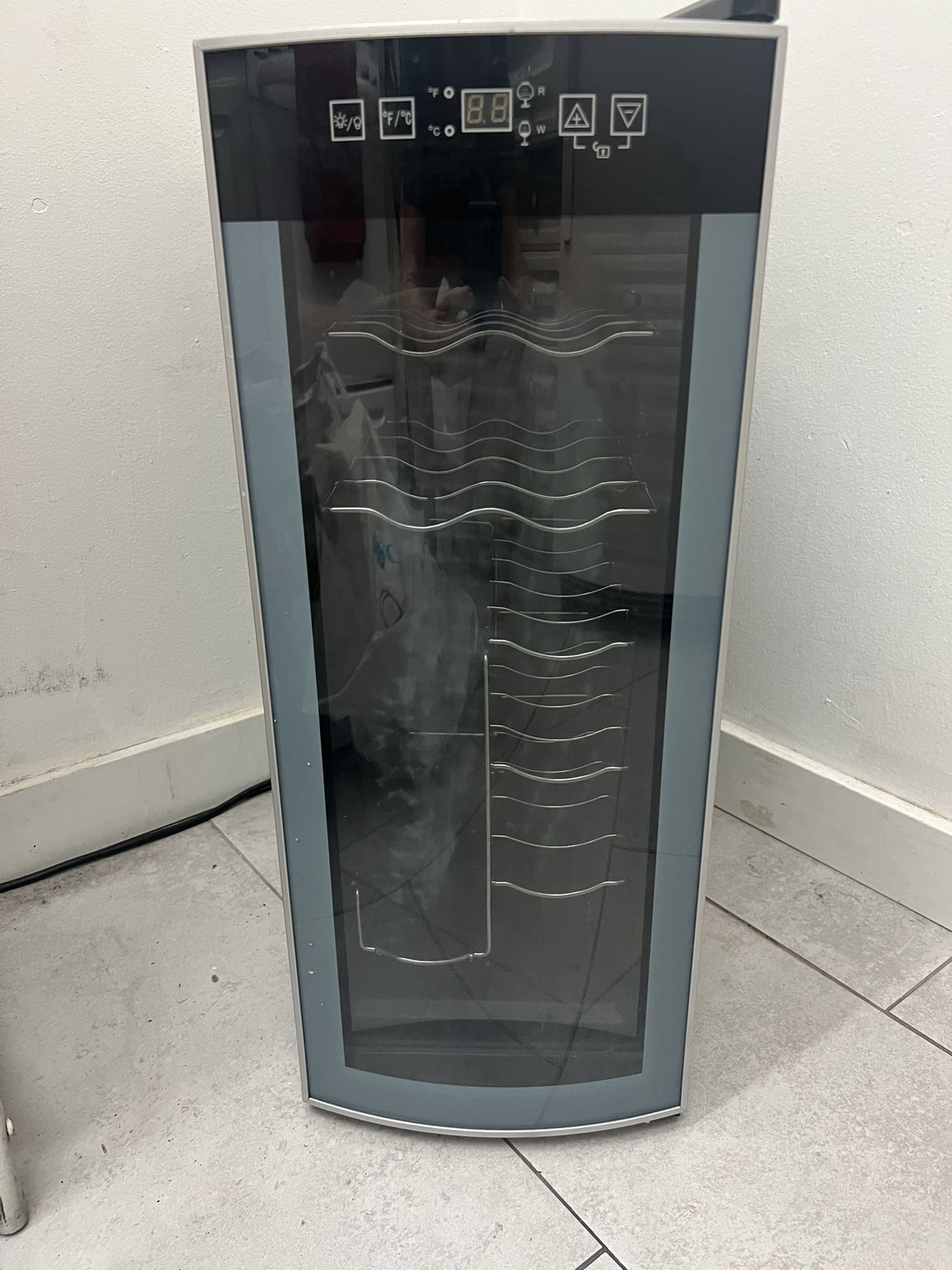 Wine Cooler By Avanti! This Small Refrigerated unit fits in tight spaces.