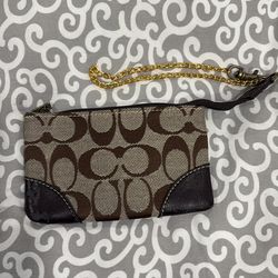 Brown Coach small wristlet.