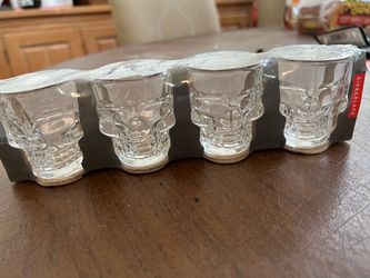 Never used  4  skull Halloween shot glasses