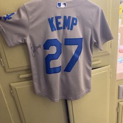 Signed Dodgers jersey signed by Erick Karos. 