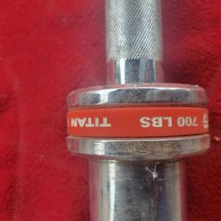 TITAN 700  OLYMPIC 7' BAR.  45LBs  USED IN GOOD CONDITION  
11525 S HALSTED  dunkin donuts/
7111.S WESTERN WALGREENS 
75$.   CASH ONLY AS IS 
