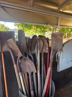 Shovels, rakes, and sledge hammer, axe, pick axes