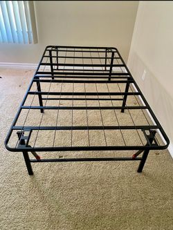 TWIN SIZE METAL BED FRAME FOLDABLE  (LIKE NEW ) (VERY STURDY)