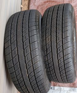 2 Uniroyal Tiger Paw tires 16"
