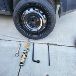 2007-2017 NISSAN VERSA SPARE KIT WITH JACK,  15"SPARE TIRE  & FRONT TOW HOOK