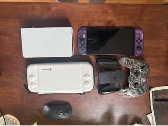 See thru/ atomic purple oled Nintendo switch