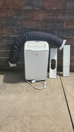 L.G. 14,000 BTU PORTABLE A.C. UNIT ICE WITH REMOTE CONTROL ICE COLD AIR COILS AND FILTER CLEANED QUIET EFFICIENT UNIT CAN COOL A LARGER AREA WORKS GRE