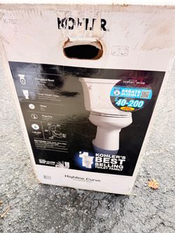 KOHLER Highline White Elongated Chair height 12-in Rough-In WaterSense 1.28 GPF Soft Close 2-piece Toilet