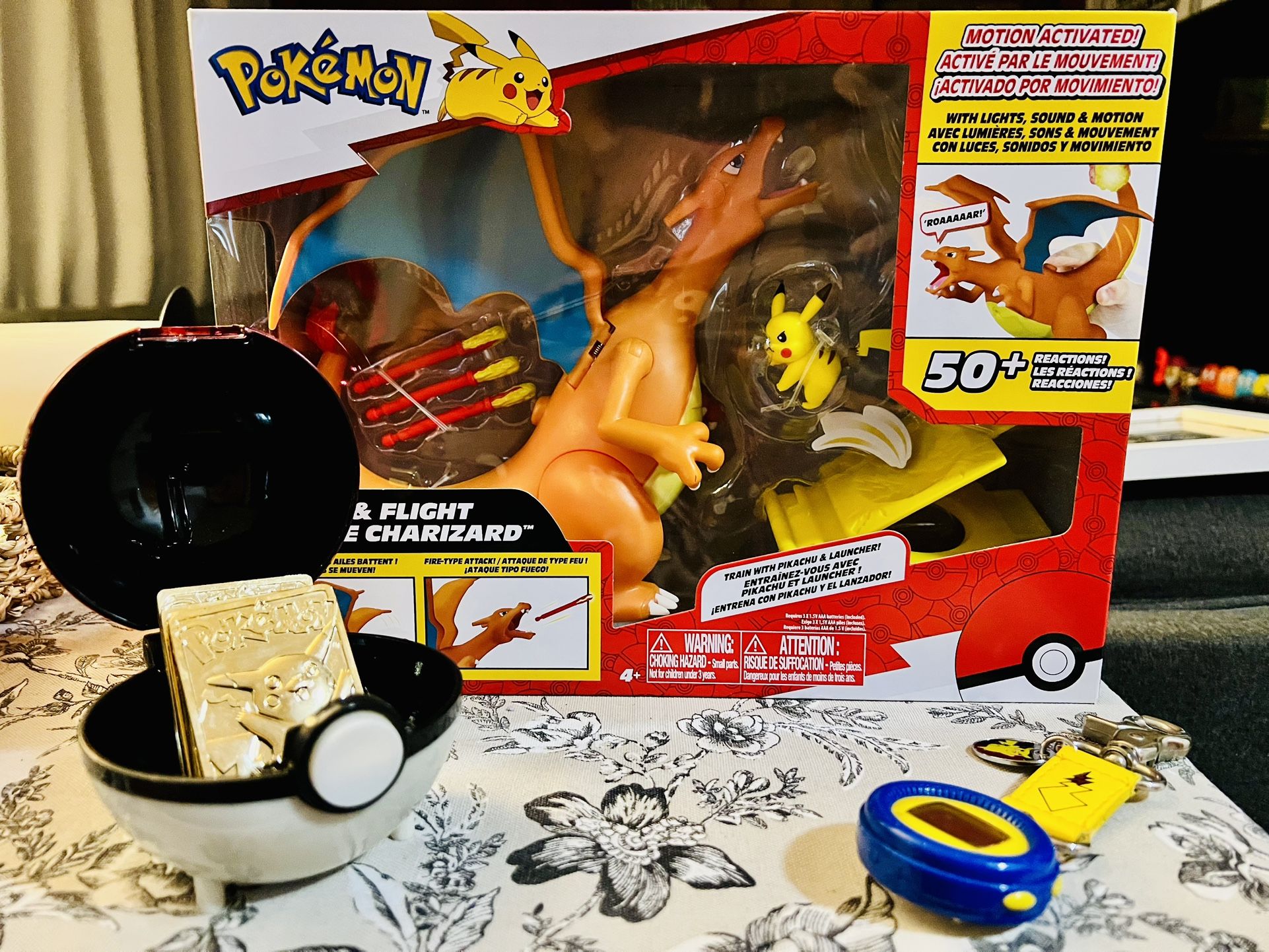 Pokémon Lot: Rare 1998 Virtual Pet Pocket Pikachu, 1999 Burger King Pokemon Gold Bars, Charizard Toy
