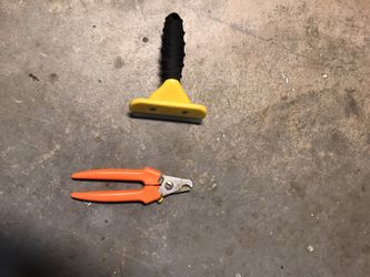 Dog nail clippers and shedding comb