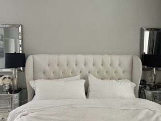 White upholstered king size headboard