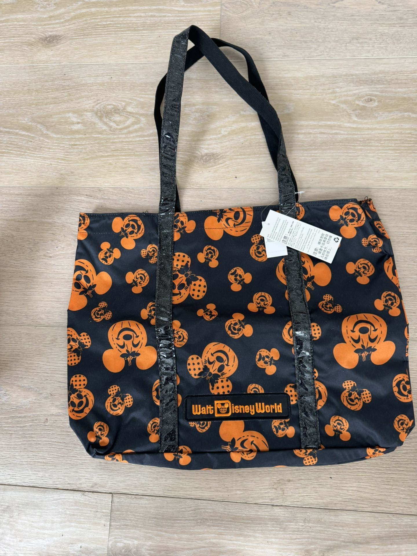 Halloween DISNEY tote bag 15” T not including handles, 19”W, brand new w/tags. MINT
