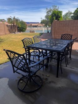 7-Piece Heavy Duty Cast Aluminum Patio Dining Set - Table, 4 Chairs, 2 Swivel Rockers