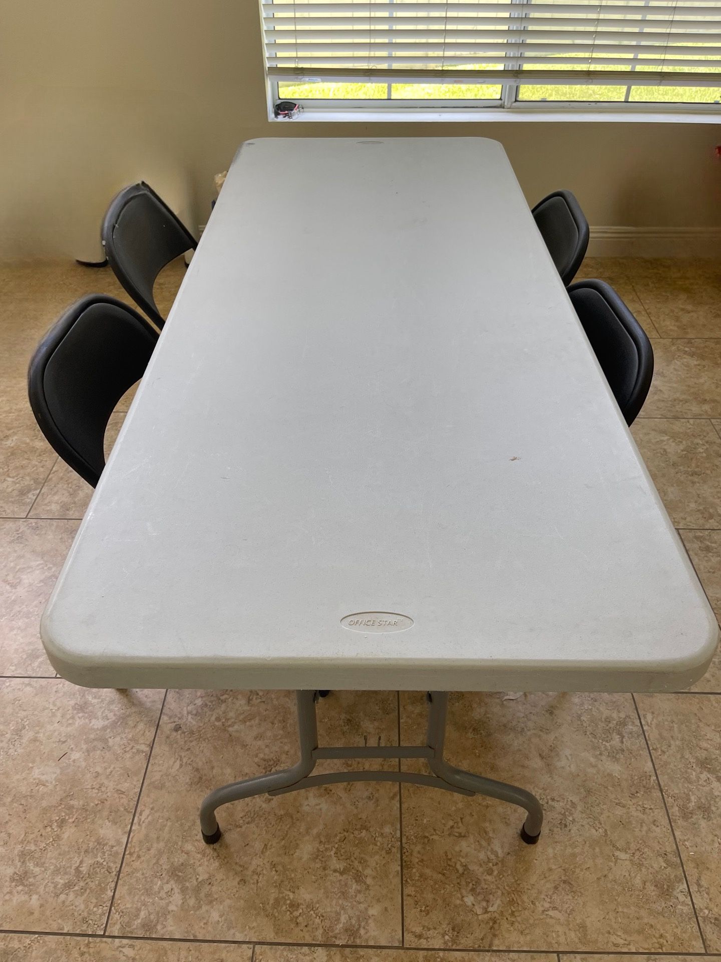 1x6’ Folding Table + 6 Folding Metal Chairs