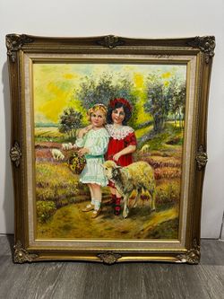 Ornate gold frame with oil painting on canvas