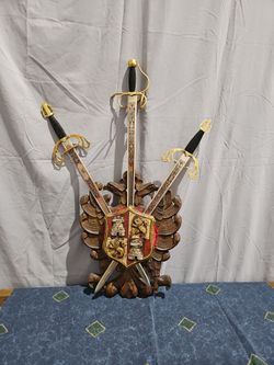 Spanish Toledo 3 30 inch sword wall mountvintage Spanish Toledo-style wall plaque featuring a hand-carved wooden double-headed eagle and coat of arms