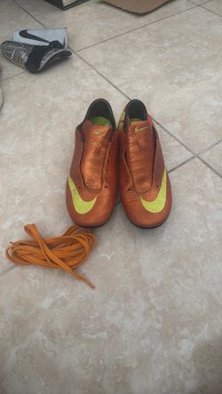 Nike soccer shoes orange