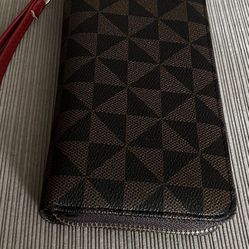 It’s A Beautiful Wallet It’s Brand New Never Been Used The Color Is Black And Brown 