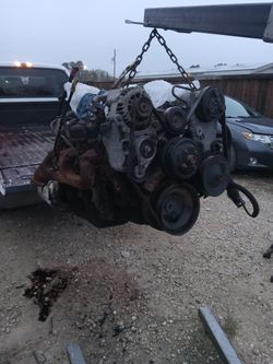 Motor completo Chevy 98....5.7 y transmision..$$ 1,000.