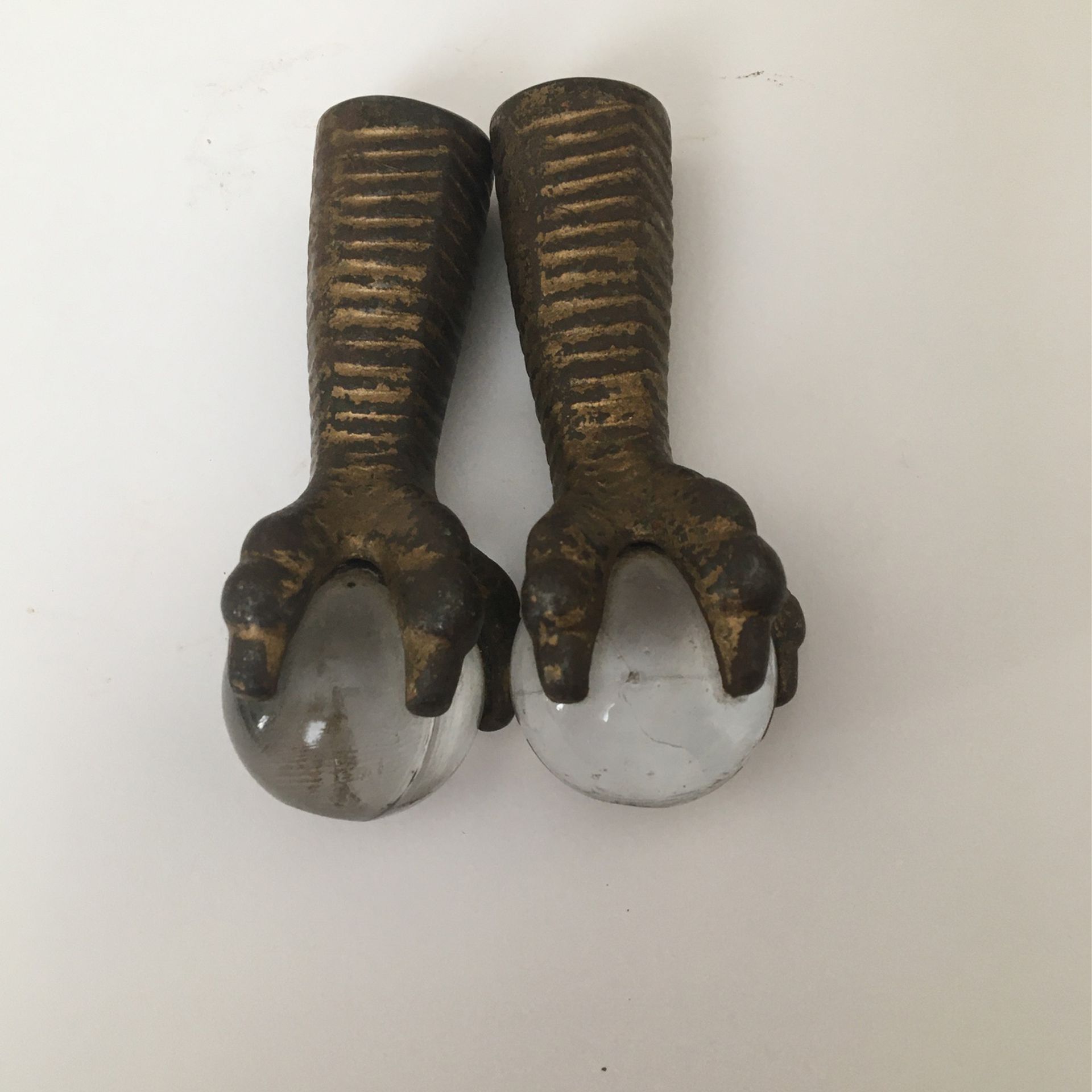 Set of two claw feet glass ball antique