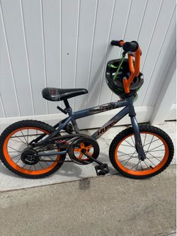 Huffy pro thunder kids bicycle with helmet
