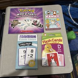 Playing cards and pokemon book