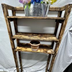 behind the toilet shelf