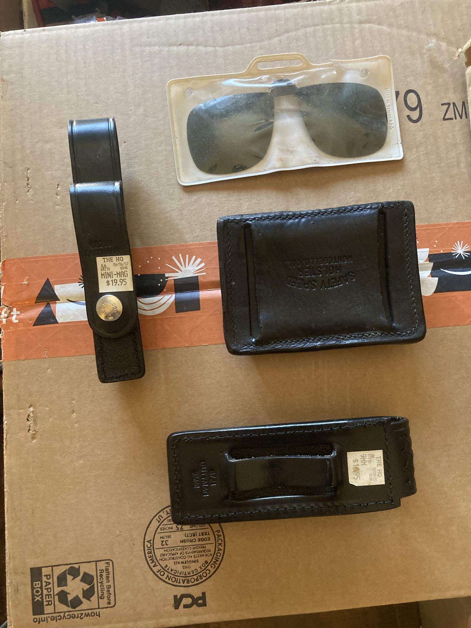 Leather sheaths and clip-on sunglasses