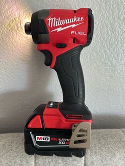Milwaukee fuel impact driver and 5.0 battery. New