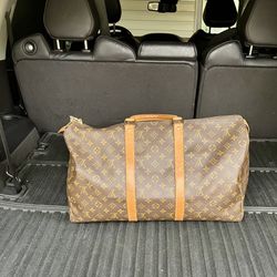 Sold at Auction: Vintage Louis Vuitton Duffle Bag