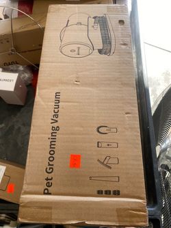Pet grooming vacuum