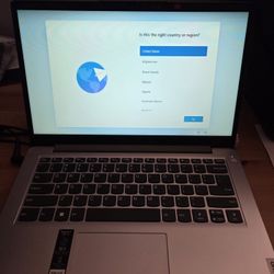 Lenovo IdeaPad 1i Laptop with Office 365 Home and Business, 128GB SSD, 4GB RAM