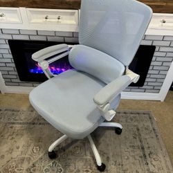 well loved baby blue office chair