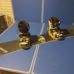 Snowboard 165cm With Bindings And 11.5 Salomon Boots + penny Board Skateboard