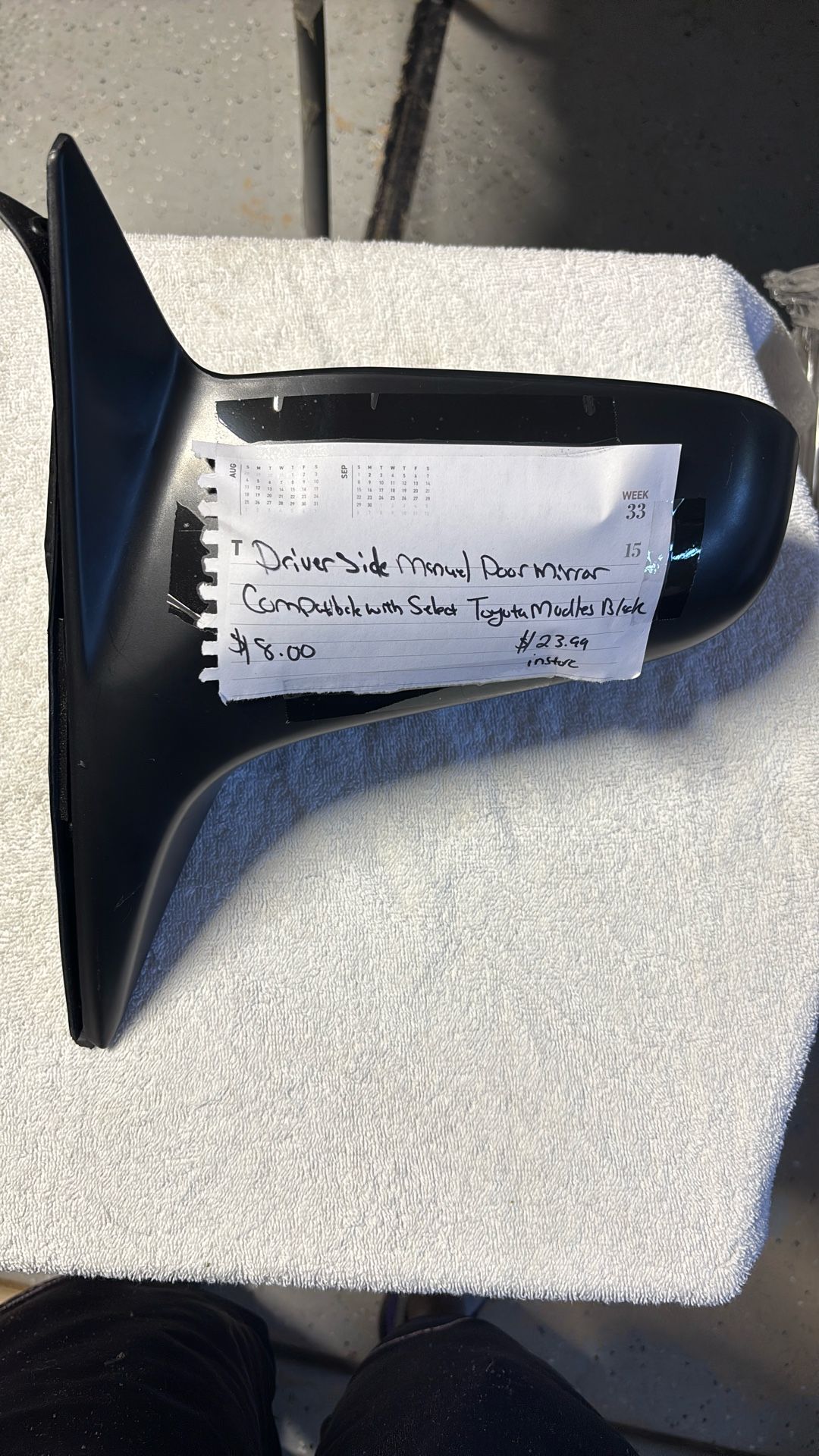 Driver side, manual door mirror